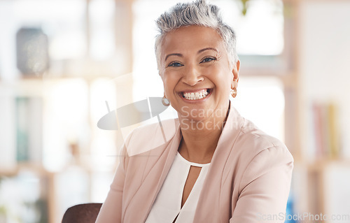 Image of Leadership, portrait and senior woman in her office with confidence, happiness and management. Leader, success and professional elderly female manager from Puerto Rico sitting in the modern workplace