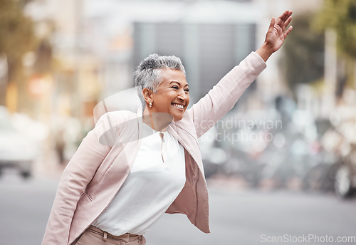 Image of City, business woman and taxi gesture in street, traveling or morning commute to work. Female executive, hands and cab for lift, transportation or happiness in urban road with smile, wave and traffic