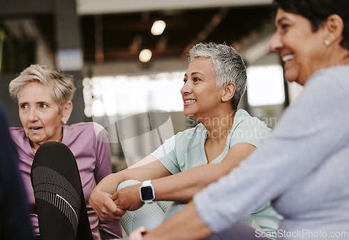 Image of Fitness, health and group of senior women talking while resting after workout in the gym. Conversation, wellness and healthy elderly female friends speaking after exercise or training in sport center