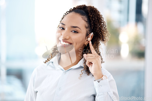 Image of Deaf, hearing aid and woman with disability and healthcare tech, portrait with health insurance and hearing aid. Medical, listening device or ear piece, young professional with help and communication