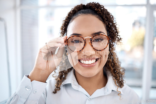 Image of Optometry, smile and portrait of black woman with glasses for eye exam, sight and vision testing at clinic. Optometrist, health and happy girl with frames, prescription lens and eyeglasses for eyes