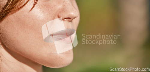 Image of Mouth, closeup and woman on mockup outdoors on blurred background for advertising and space. Half, face and girl relax on copy space, content and peaceful, natural and calm with product placement