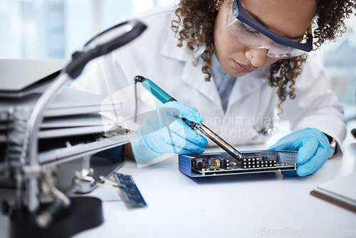 Image of Programming, hardware repair and black woman electrician working on cpu, circuit and microchip. Technology maintenance, soldering iron and female technician fix coding, motherboard and processor