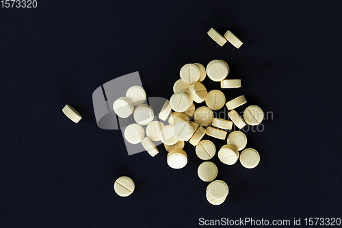 Image of yellow tablets for flu diseases