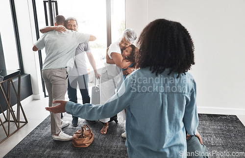 Image of Big family, welcome hug and thank you gesture of grandparents, children and mom in a house. Living room, love and parent care with kids and mother back in a house greeting senior people in a lounge