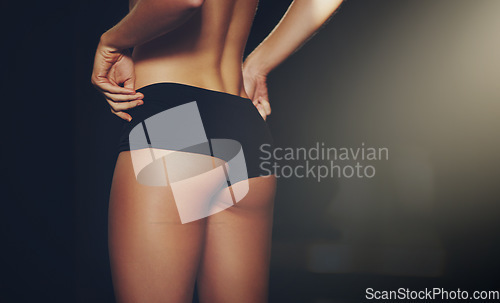 Image of Back view of woman, ass and black underwear on studio background for weightloss mockup, diet and slim size. Closeup female model, butt and sexy lingerie of aesthetic liposuction, beauty and fit body