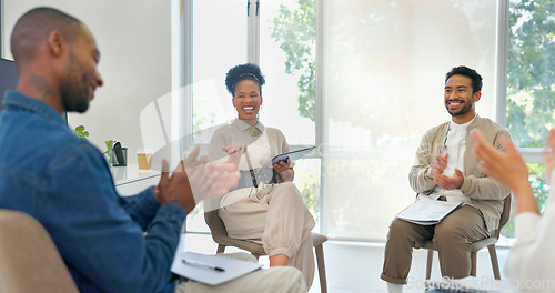 Image of Business people, talking or clapping in success meeting, training or workshop in office growth, target or goal. Smile, happy or teamwork in winner applause, diversity achievement or paper celebration