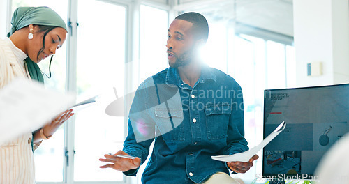 Image of Black businessman, mentor or diversity meeting on paper, documents or review in coaching or training feedback. Speaker, leadership or talking in workshop, collaboration or teamwork strategy planning