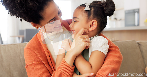 Image of Happy, mother and child with hug, kiss and love for playful relationship bonding on living room sofa at home. Mama and kid playing together in happiness for loving care or joy relaxing on the couch