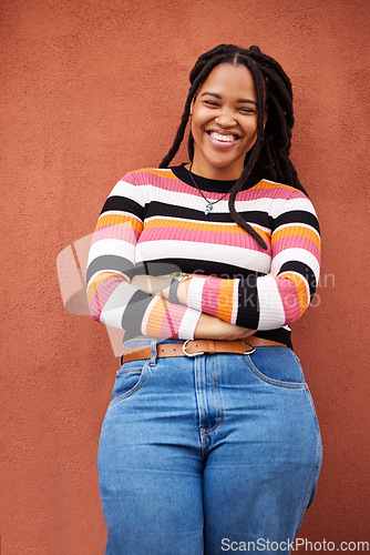 Image of Portrait, proud and black woman on mockup in studio, happy, relax and smile on orange background. Face, confident and girl in positive, mindset and good mood on wall, advertising or product placement