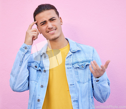 Image of Confused, question and portrait of a man thinking isolated on a pink background in studio. Doubt, idea and face of a person with a solution, difficult decision and thoughts of a choice on a backdrop