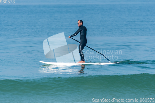 Image of Stand up paddle surfer