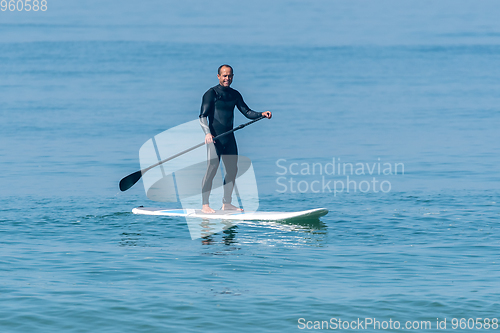 Image of Stand up paddle surfer