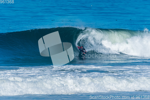 Image of Bodyboarder surfing ocean wave