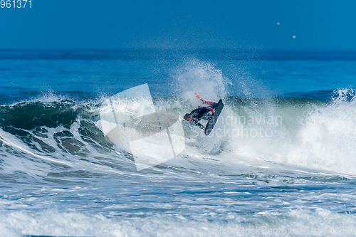 Image of Bodyboarder surfing ocean wave