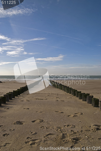 Image of North Sea beach with breakwater,Netherlands