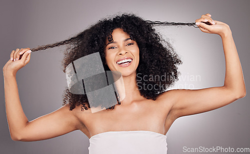 Image of Hair in hands, beauty and portrait of black woman for wellness, natural growth and curly style. Salon aesthetic, luxury cosmetics and happy girl smile holding strand for keratin treatment results