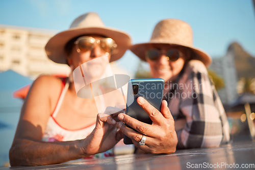 Image of Senior, friends and phone for selfie, internet or search on vacation, break or summer holiday on blue sky background. Elderly, women and profile picture photo at an outdoor restaurant while traveling