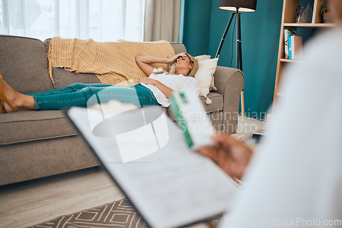 Image of Psychology, mental health and woman at a counseling session relaxing on a sofa while talking. Therapy, rest and emotional female patient lying on the couch in the therapist office during consultation