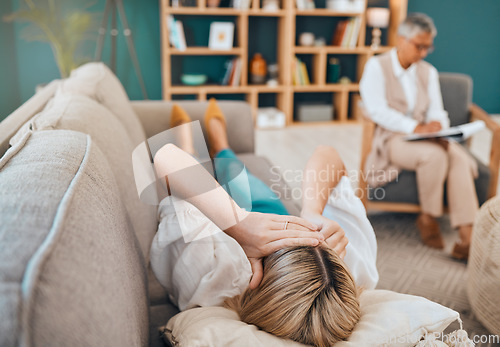 Image of Mental health, woman lying on sofa and psychologist consulting, writing notes on clipboard for advice in office. Stress, anxiety and healthcare, sad person crying with therapist in consultation room.