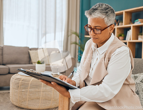 Image of Planning, notes and mature woman in therapy with a strategy, plan and reading a case. Psychology, analysis and psychologist with paperwork after counseling to check for mental health problem