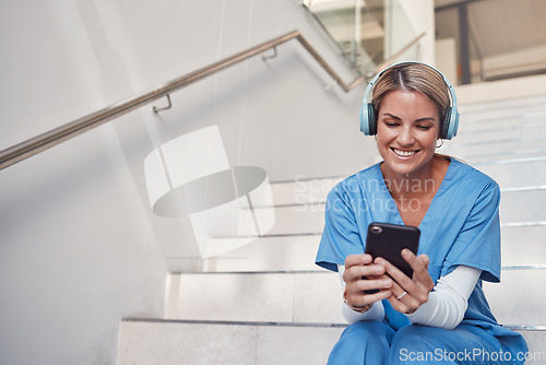 Image of Doctor, phone and stairs for consultation, communication or video call outside hospital for health advice. Happy woman nurse smiling in healthcare with smartphone and headset for telemedicine