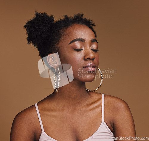 Image of Makeup, beauty and black woman in studio for wellness, cosmetics and skincare on brown background. Glamour, aesthetic and girl relax with luxury, treatment and skin pamper routine while isolated