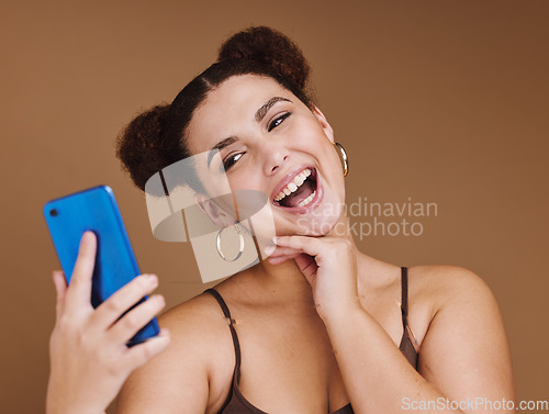 Image of Selfie, happiness and woman with a phone feeling excited, happy and beauty for profile picture. Social media, isolated and studio background with mock up of gen z, young and face of a young person