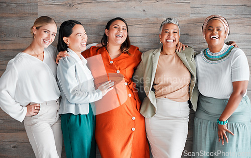 Image of Happy, smile and portrait of a pregnant woman with her friends by a wood wall at her baby shower. Friendship, diversity and females supporting, loving and bonding with a lady with pregnancy together.