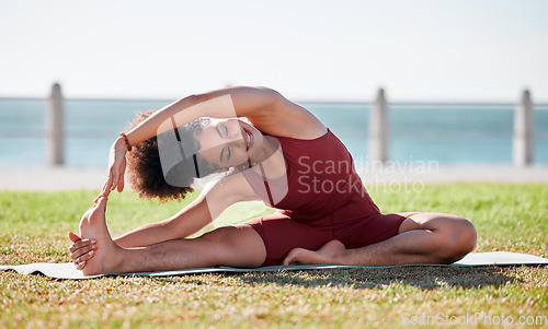 Image of Yoga, fitness and black woman stretching body on grass for healthy lifestyle, wellness and cardio workout. Sports, pilates and girl doing meditation, training and exercise for zen, peace and calm