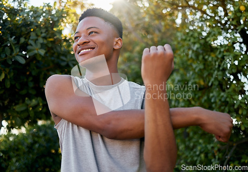 Image of Stretching, thinking and black man in nature for running, fitness and sports in Morocco. Runner, training and athlete with a warm up to start with exercise, cardio and outdoor sports in a park