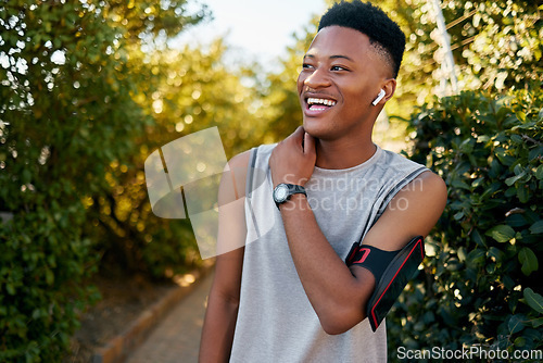 Image of Exercise, black man outdoor and training for fitness, wellness and happiness for motivation. African American male, guy and athlete with smile, workout and performance for cardio, energy and power