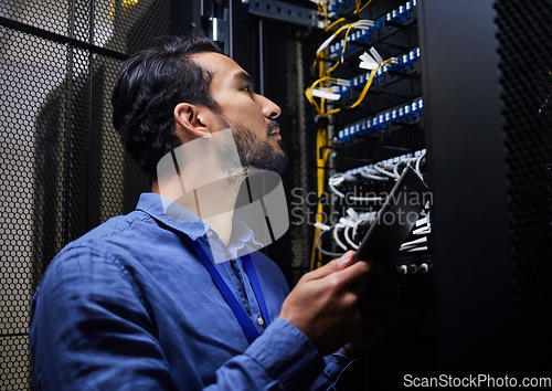 Image of Tablet database, server room and engineer man looking at connection cables for maintenance or software update at night. Cybersecurity wire, it programmer and male with tech for data center networking
