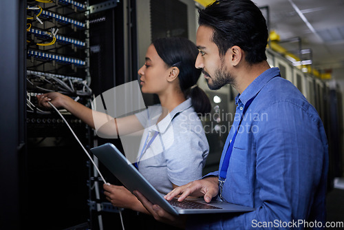 Image of Man, woman or server room maintenance on laptop IT, software programming ideas or cybersecurity engineering. People, repair or data center technology in teamwork collaboration of safety analytics fix