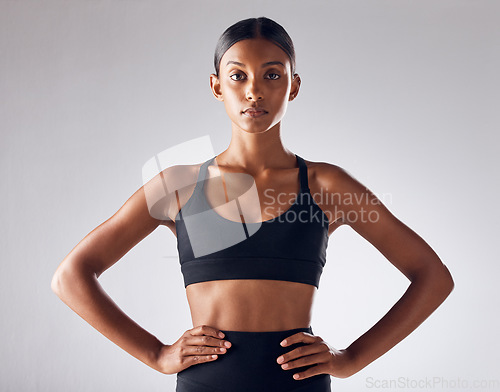 Image of Fitness, sports and health with portrait of Indian woman for training, workout and wellness goals. Exercise, diet and mindset with girl athlete for mission, cardio and motivation in studio background