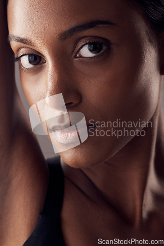 Image of Indian woman, beauty and skincare portrait of a young model with skin glow from facial. Cosmetics, face and person with wellness and spa care after dermatology, detox and treatment in a studio