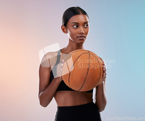 Image of Basketball exercise, sports and studio woman for workout challenge, practice game or fitness competition. Performance training, health commitment and athlete model isolated on gradient background