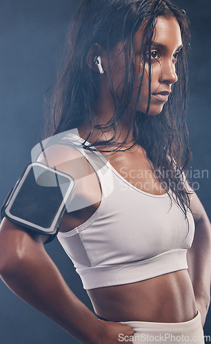 Image of Black woman profile, studio and training with earphones for fitness, phone and music for focus mind. Gen z girl, personal trainer and smartphone for vision, motivation and mindset for workout goal