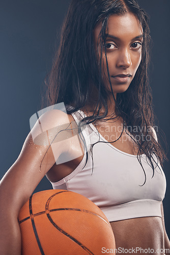 Image of Basketball player portrait, sports workout and woman for studio challenge, practice game or fitness competition. Performance training, health exercise and athlete model isolated on dark background