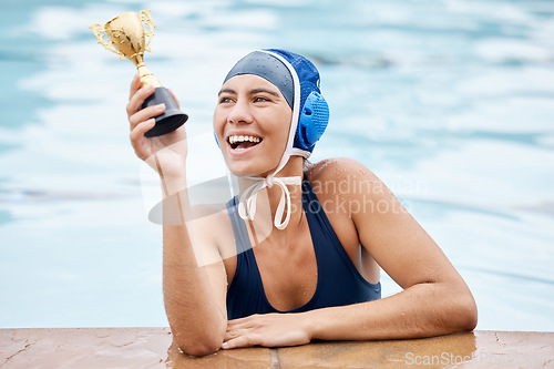 Image of Swimming pool, trophy and a winner sports woman in water, feeling proud after a competitive race. Gold, award or exercise with a female swimmer winning a competition and happy with her achievement