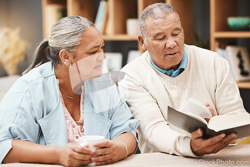 Image of Book, reading and senior couple with bible for spiritual studying, faith and relax in home with coffee. Religion, tea and retired man and woman with holy text for learning, education or worship God.