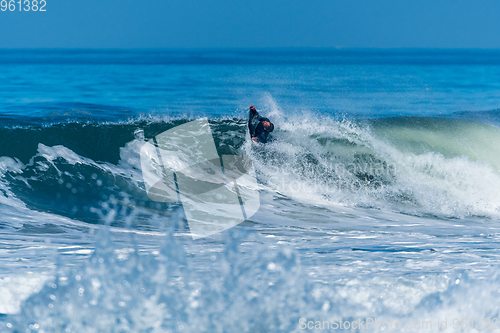 Image of Bodyboarder surfing ocean wave