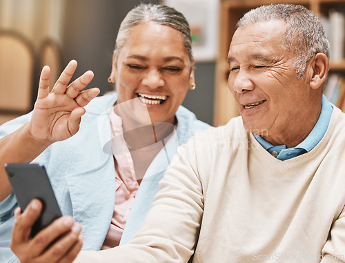 Image of Video call, wave or happy old couple talking, communication or speaking in conversation in retirement. Partnership, elderly man or senior woman greeting online on phone at home together with smile