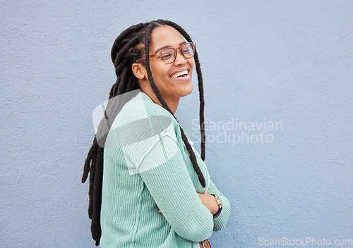 Image of Happy, proud and black woman with mockup in studio for advertising, space and joy on grey background. Happiness, smile and girl relax on wall, laugh and excited with product placement or copy space