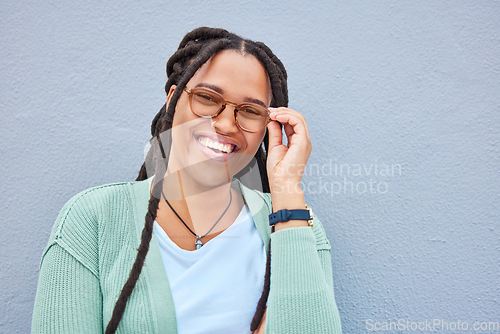 Image of Smile, portrait and black woman on mockup, happy and confident on grey wall background, cheerful and carefree. Face, space and girl relax on copy space for advertising, product placement and isolated