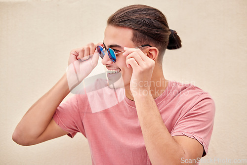 Image of Happy man, retro or fashion sunglasses on isolated background in marketing branding, optometry sale or mockup. Smile, model or student in summer optician vision, eyes healthcare wellness or promotion