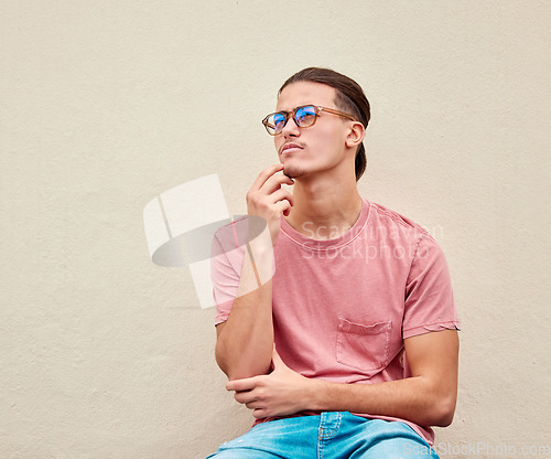 Image of Confused, man and thinking on mockup in studio for advertising, wall background or space. Doubt, contemplate and male pensive, thoughtful and puzzled on copy space, unsure and emoji gesture isolated