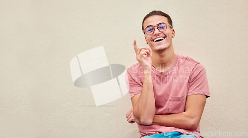 Image of Portrait, glasses or man pointing up on isolated background for advertising branding, optometry sales deal or mockup marketing. Happy, student or showing hands gesture in fashion eyes vision or news