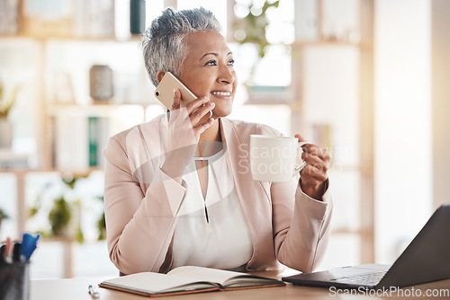 Image of Senior woman, phone call and coffee by laptop in communication, conversation or discussion at office desk. Elderly female on smartphone smiling with cup talking about business idea plan or networking