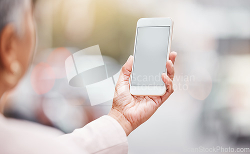 Image of Businesswoman, hands and mockup phone in city for data management, gps app and review analytics news. Worker, smartphone mock up space and urban tech for networking, mobile research and media website